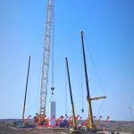 “零偏差”！西北戈壁現(xiàn)風(fēng)電“超級大片”，徐工XLC18000M領(lǐng)銜多機(jī)協(xié)同吊裝