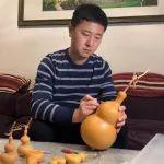 “一绘一押”展现非遗之美