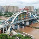 中鐵大橋局承建的平陸運(yùn)河永福大橋拱肋合龍