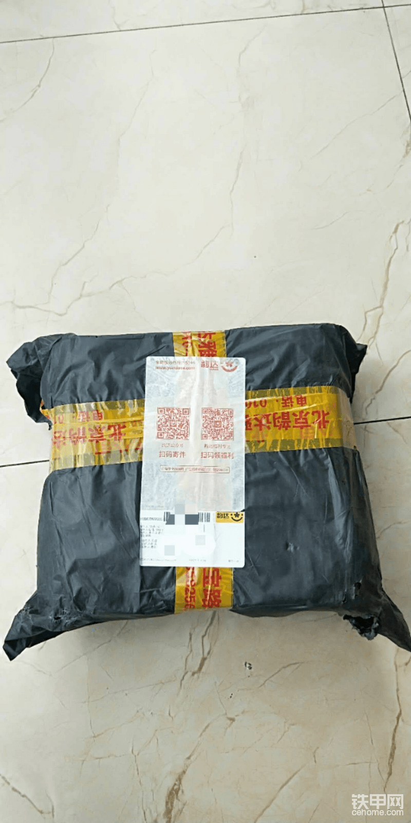 還沒進家門就迫不及待的在門口拆開包裹